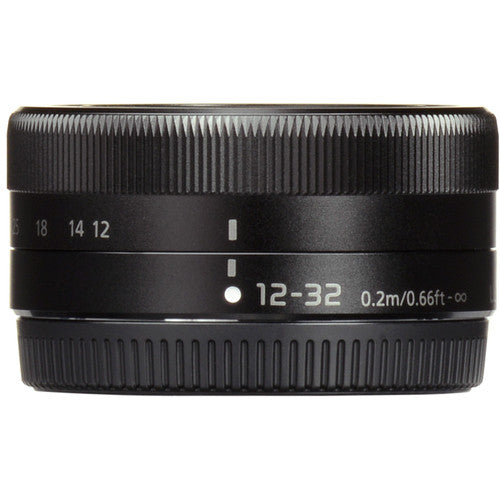 Panasonic Lumix G100 Mirrorless Camera with 12-32mm Lens + Tripod Grip
